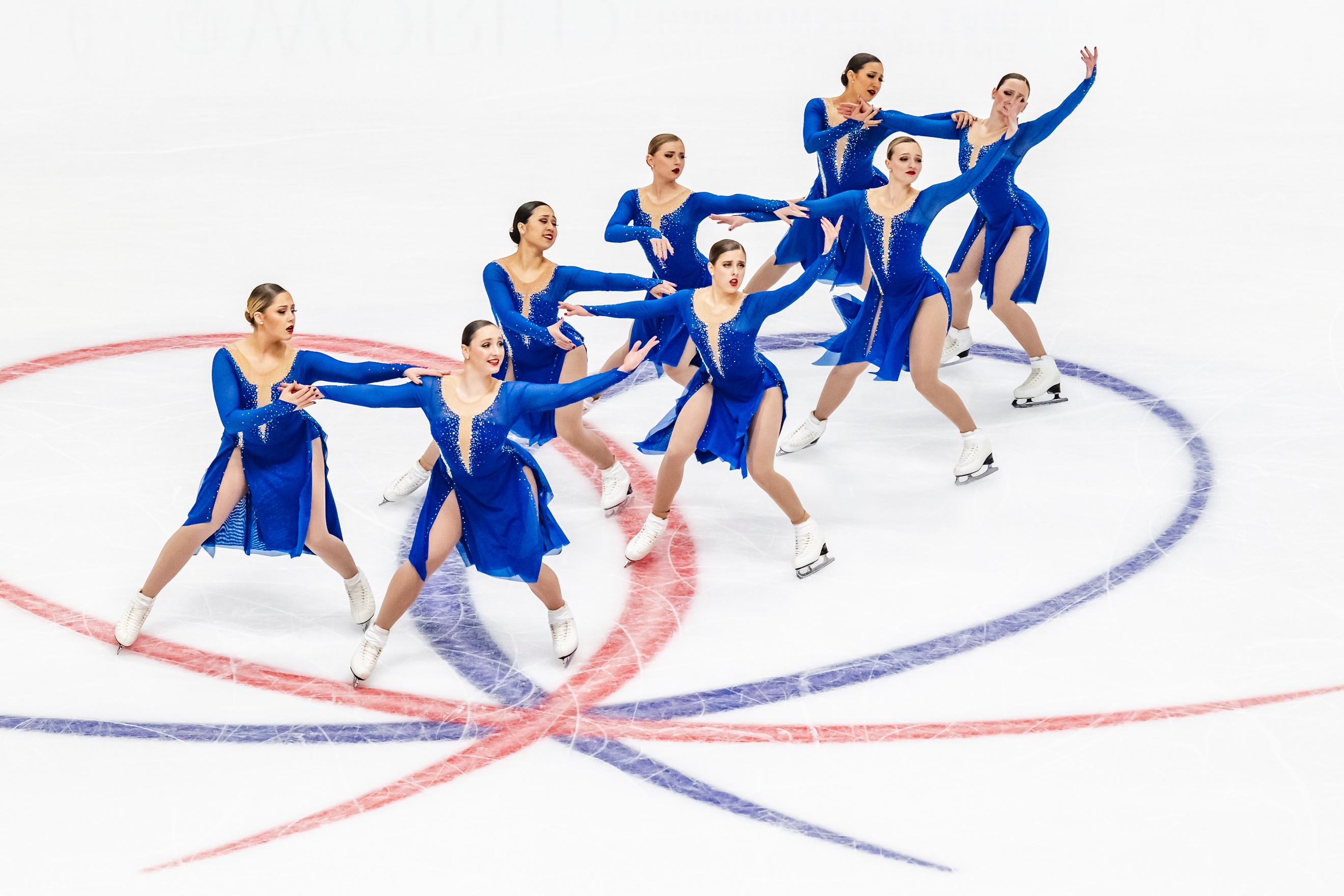 A group of women ice skatingAI-generated content may be incorrect.