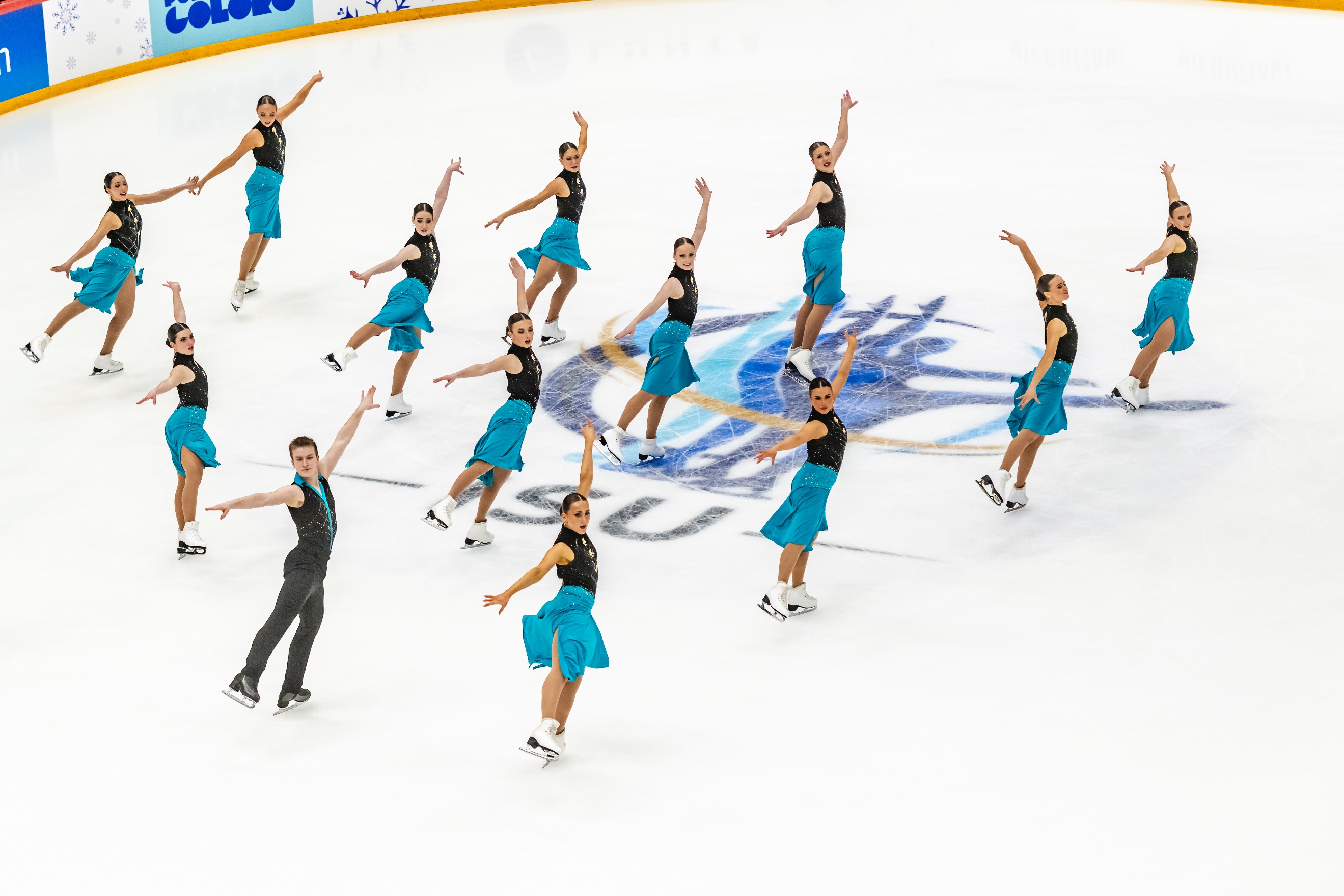 A group of people on ice skatingAI-generated content may be incorrect.