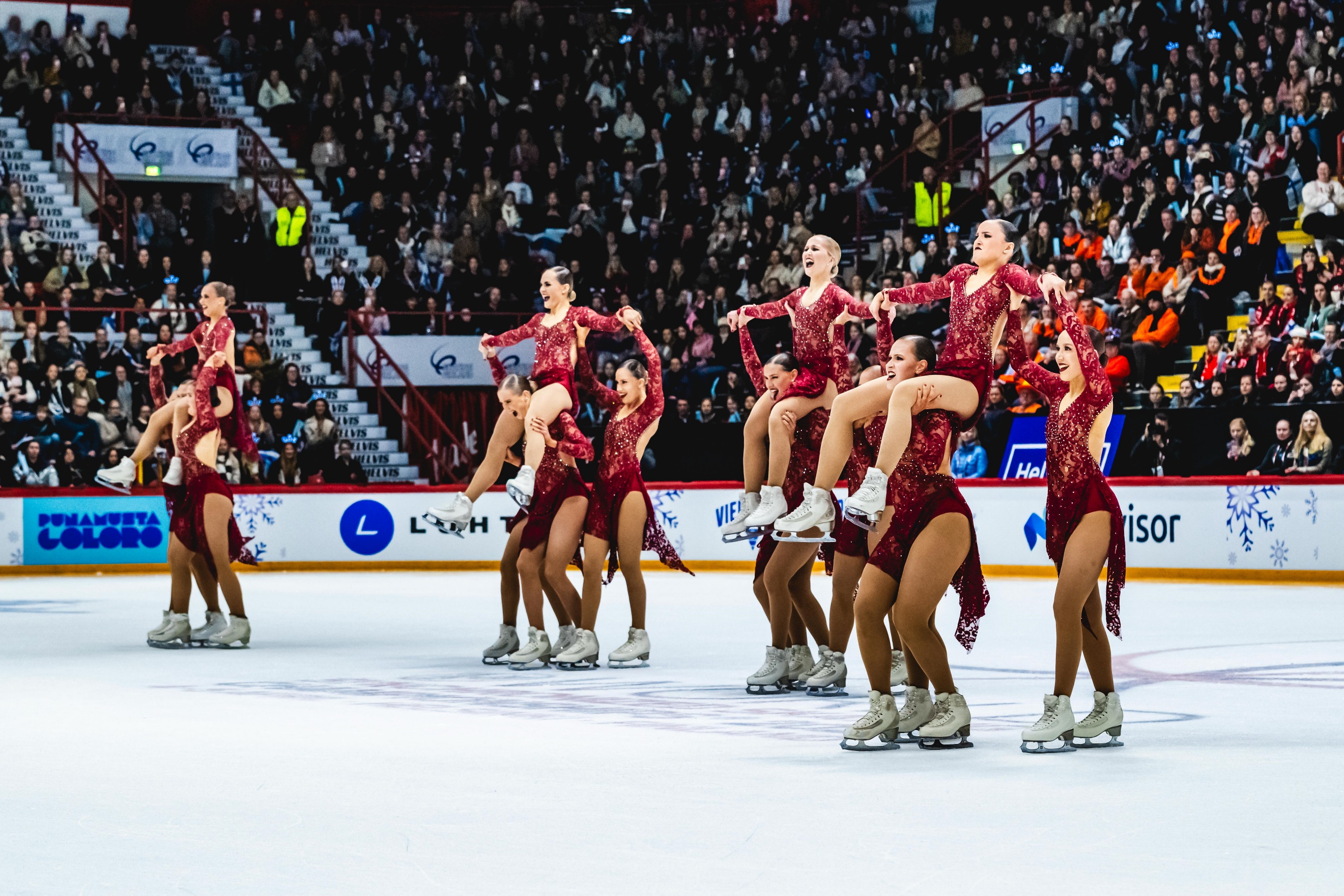 A group of women on ice skatingAI-generated content may be incorrect.