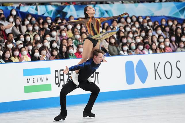 A person and person on ice skatingAI-generated content may be incorrect.