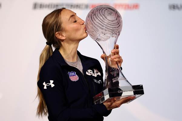 A person kissing a trophyAI-generated content may be incorrect.