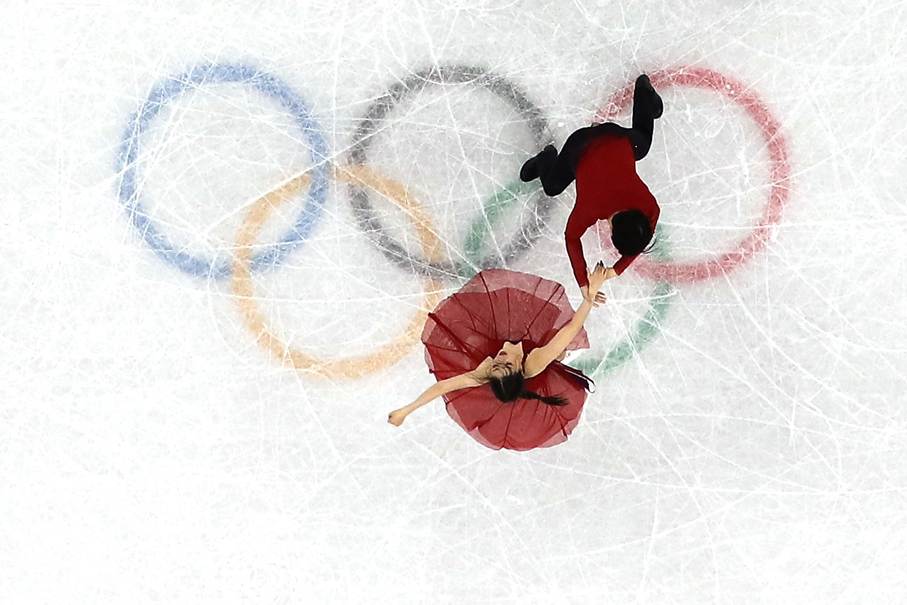 A couple ice skating on iceAI-generated content may be incorrect.