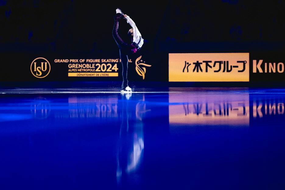A person skating on iceAI-generated content may be incorrect.