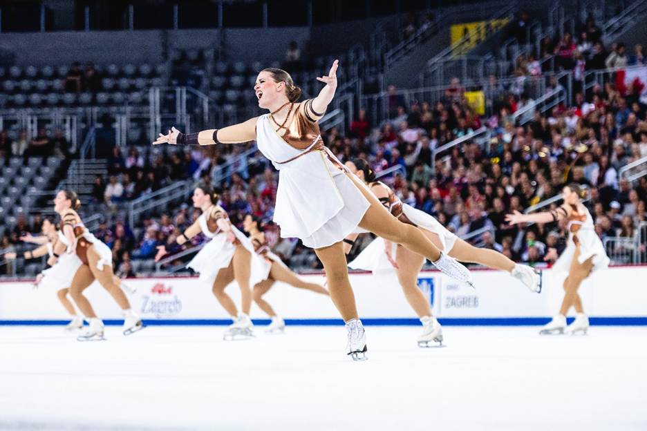 A group of women ice skatingAI-generated content may be incorrect.
