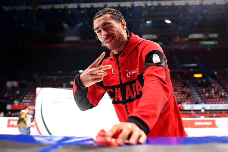 A person in a red jacketAI-generated content may be incorrect.